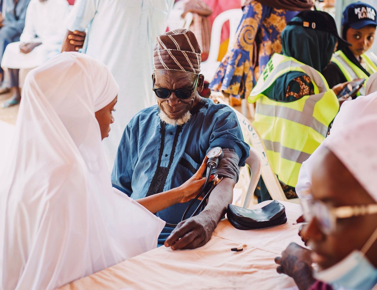 about-01 Elderly man receives medical care during community health outreach in Kaduna, Nigeria.